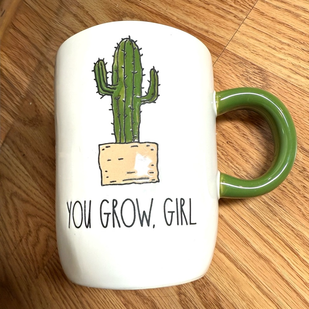 Rae Dunn "You Grow Girl" ceramic coffee mug features a green cactus illustration